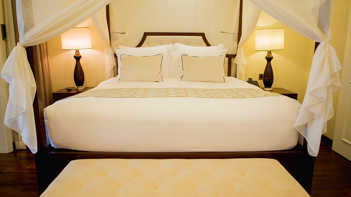 luxury suite with four poster bed